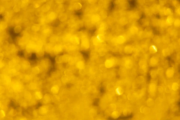 抽象的な休日の背景 黄金のボケの輪のクローズアップ — ストック写真