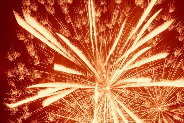 Astratto Sfondo Vacanza Fuochi Artificio Giallo Brillante Contro Sfondo Rosso — Foto Stock
