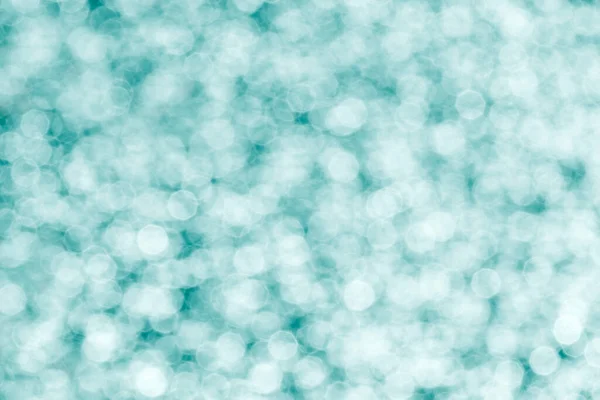 abstract turquoise background: close up of bokeh circles