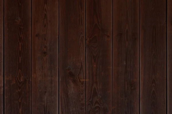 竖直木板制成的深褐色木墙 — 图库照片