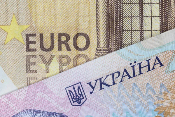 Nahaufnahme Von Fünfzig Euro Und Zweihundert Ukrainischen Hrivnya Banknoten — Stockfoto