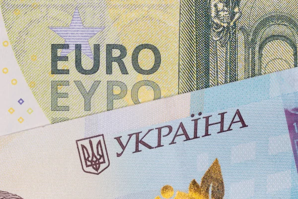 Zblízka Sto Euro Tisíc Ukrajinských Hrivnya Bankovek — Stock fotografie