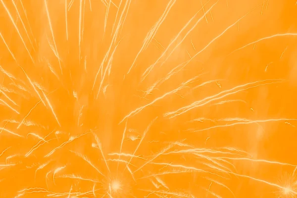 Abstract Vakantiedecor Vuurwerk Tegen Oranje Achtergrond — Stockfoto