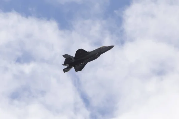 Stock image PARIS, FRANCE - June 25, 2017: jet fighter F 35 flying in cloudy sky at Paris Air Show