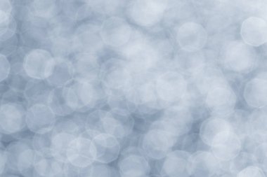 Soyut tatil arkaplanı: açık mavi bokeh daireleri