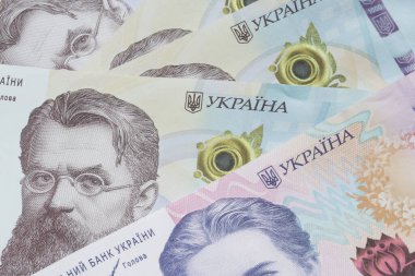 close up of several Ukrainian hrivnya banknotes