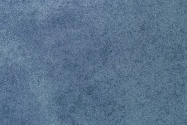 Soyut grimsi mavi renk arkaplanı: lekeli tuval dokusunun kapatılması