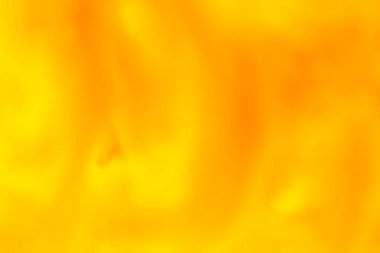 soyut sanatsal arkaplan: sarı ve turuncu sıvı suluboya boyaların kapatılması
