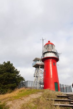 Red lighthouse on Dutch wadden island Vlieland