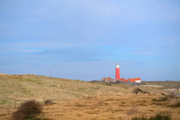 荷兰浅滩上的红色灯塔岛 Texel 图库照片