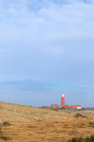 Roter Leuchtturm Auf Holländischer Wattenmeerinsel Texel lizenzfreie Stockfotos