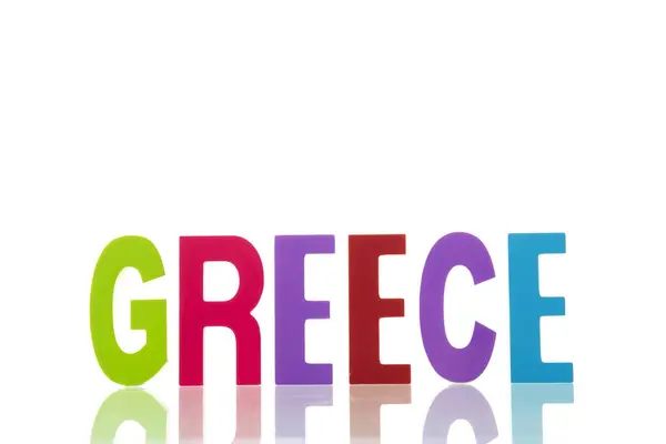 白い背景の上に隔離された多色のギリシャのテキスト ストック写真