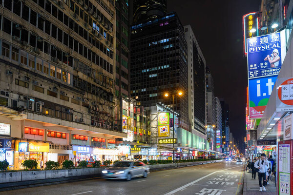 Hong Kong, China - Mar 06, 2019 : Mongkok District at night in Hong Kong, China. Mongkok in Kowloon Peninsula is the most busy and overcrowded district in Hong Kong