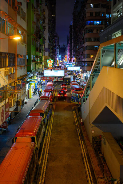 Hong Kong, China - Mar 06, 2019 : Mongkok District at night in Hong Kong, China. Mongkok in Kowloon Peninsula is the most busy and overcrowded district in Hong Kong