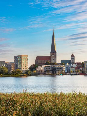 View over the river Warnow to the city of Rostock, Germany.