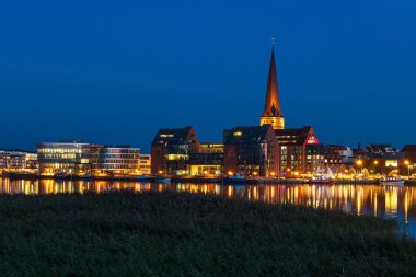 View over the river Warnow to the city of Rostock, Germany.