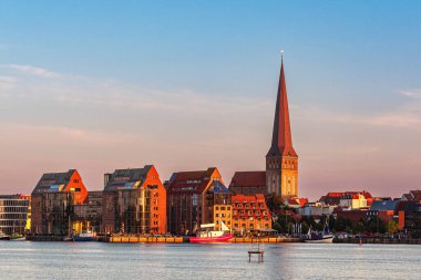 View over the river Warnow to the city of Rostock, Germany.