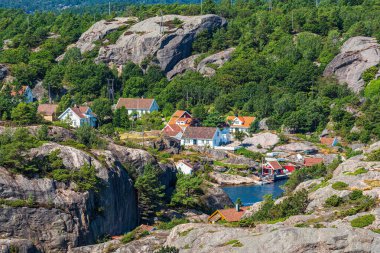 Houses on the archipelago island of Kapelloya in Norway. clipart