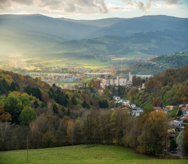 Wolfsberg in Austria on Alpine landscape background clipart