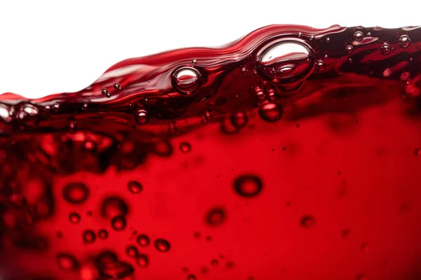 赤ワインの白の背景には 抽象的な水しぶき孤立した マクロショット — ストック写真