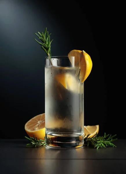 Cold Refreshing Drink Ice Lemon Rosemary Black Background — Stock Photo, Image
