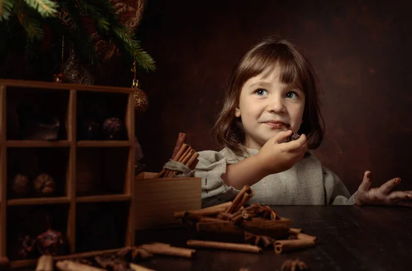Little Girl Eats Chocolates Christmas Tree — Stock Photo, Image