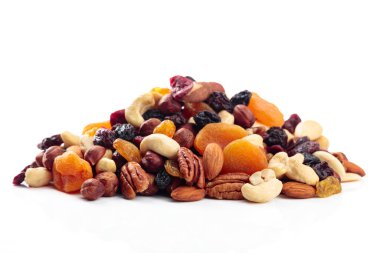 Mix of nuts and dried fruits isolated on a white background. Presented apricots, raisins, walnuts, hazelnuts, cashews, pecans, and almonds. clipart