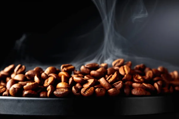 Steaming Coffee Beans Black Background Selective Focus Copy Space —  Fotos de Stock