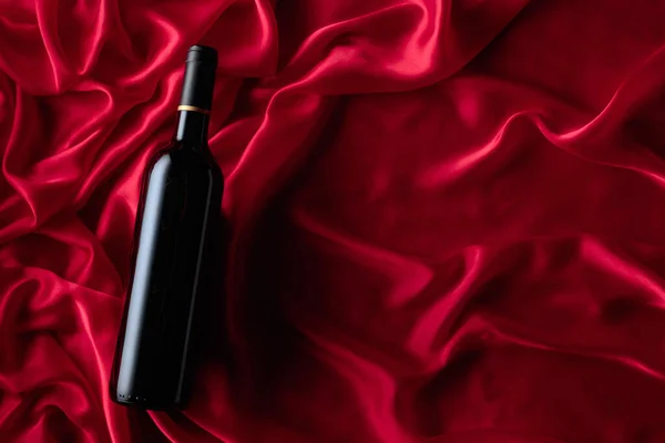 Bottle Red Wine Satin Background Top View —  Fotos de Stock