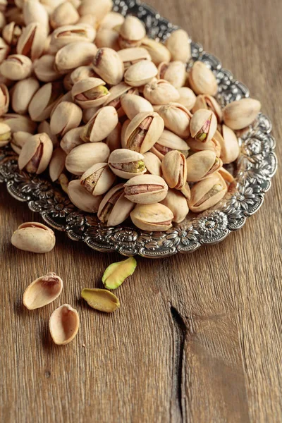 Salted Pistachios Dish Old Wooden Table — Stok fotoğraf