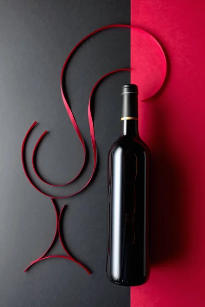 Bottle Red Wine Red Satin Ribbons Top View — Stock Photo, Image