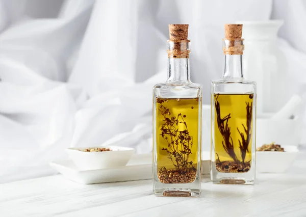 Bottles Olive Oil Spices White Wooden Table Copy Space — Fotografia de Stock
