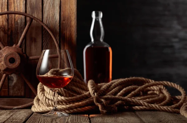Snifter Bottle Rum Cognac Whiskey Old Wooden Background Copy Space —  Fotos de Stock