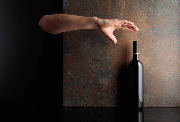 Hand Reaches Bottle Red Wine Concept Image Theme Expensive Wines — Stock Photo, Image