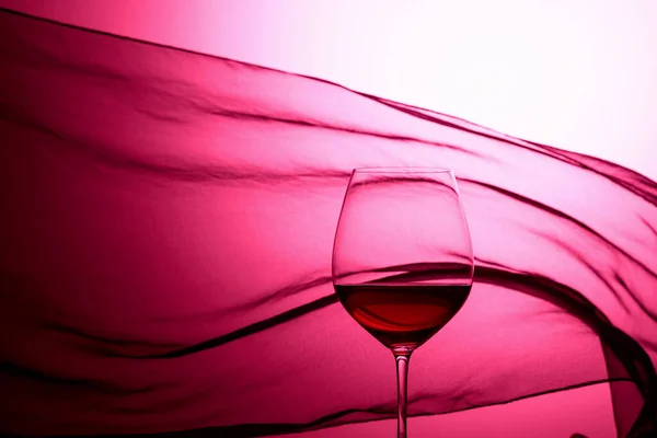 Glass Red Wine Background Waving Satin Curtain Red Backlit — Stock Photo, Image