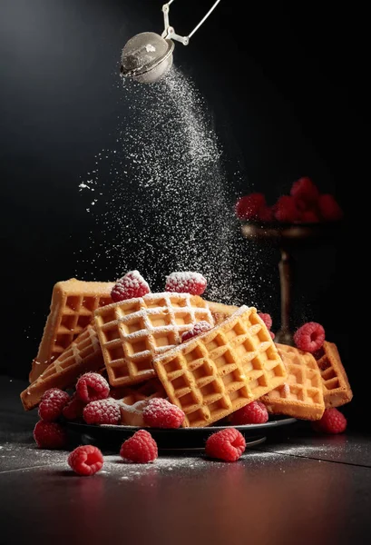 Belgian Waffles Raspberries Sprinkled Powdered Sugar Waffles Raspberries Black Background — Stock Photo, Image