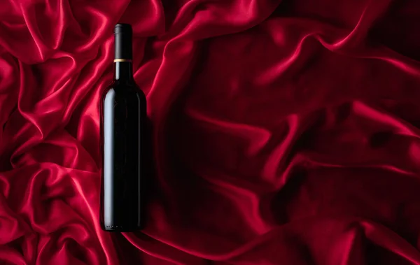 Bottle Red Wine Satin Background Top View — Stock fotografie