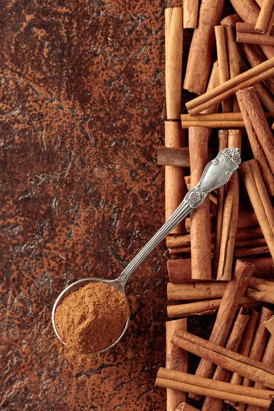 Cinnamon Powder Spoon Cinnamon Sticks Brown Background Top View Copy — Stock Photo, Image