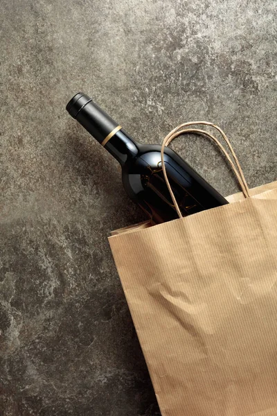 Paper Shopping Bag Bottle Red Wine Old Stone Background Top — Stock Photo, Image