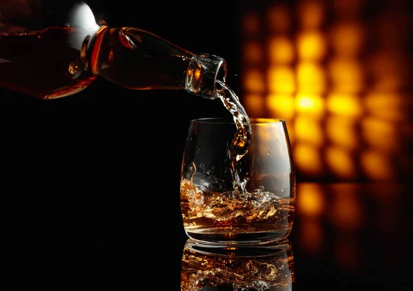 Pouring Whiskey Glass Black Background Copy Space — Stock Photo, Image