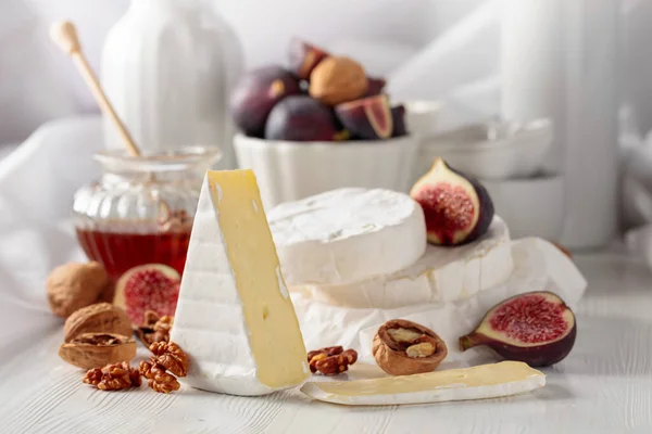 Camembert Cheese Figs Walnuts Honey White Wooden Table — Stock Photo, Image