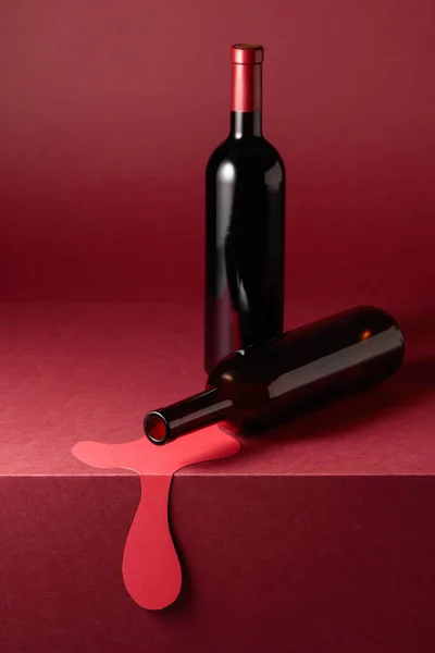 Botellas Vino Tinto Sobre Fondo Tinto Concepto Del Tema Del —  Fotos de Stock