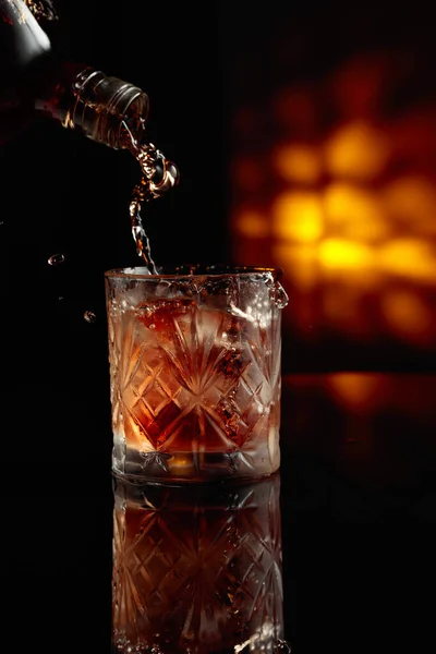 Pouring Whiskey Bottle Glass Ice — Stock Photo, Image