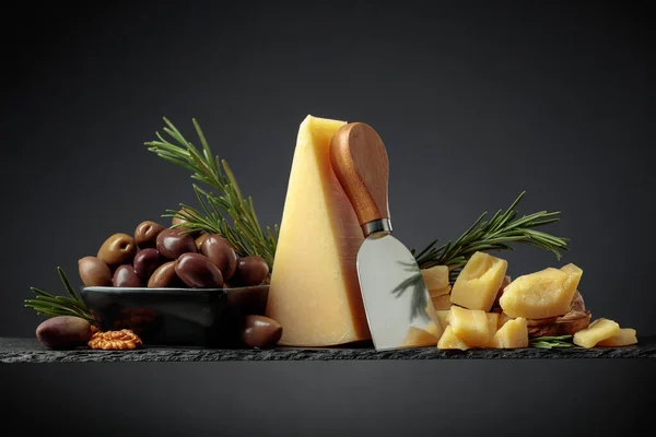 Parmesan Cheese Knife Olives Rosemary Black Background — Stockfoto