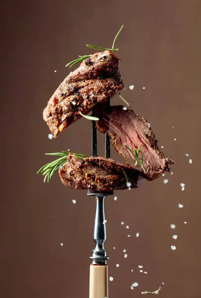 Grilled Beef Steak Rosemary Brown Background Beef Steak Fork Sprinkled — Stock Photo, Image