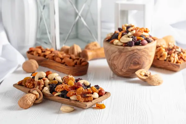 Mix Nuts Raisins White Wooden Table Presented Raisins Walnuts Hazelnuts — Stock Photo, Image