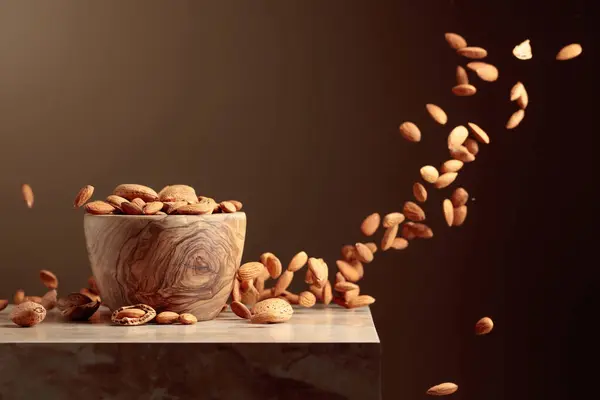Almond Nuts Poured Wooden Bowl Brown Background Copy Space — Stock Photo, Image