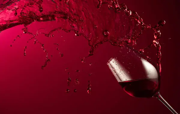Glass Red Wine Splash Dark Red Background Copy Space — Stock Photo, Image