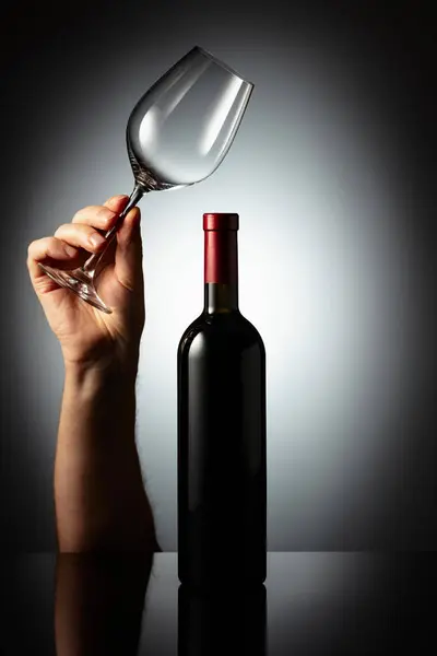 Unopened Bottle Red Wine Hand Wine Glass Concept Wine Theme — Stock Photo, Image