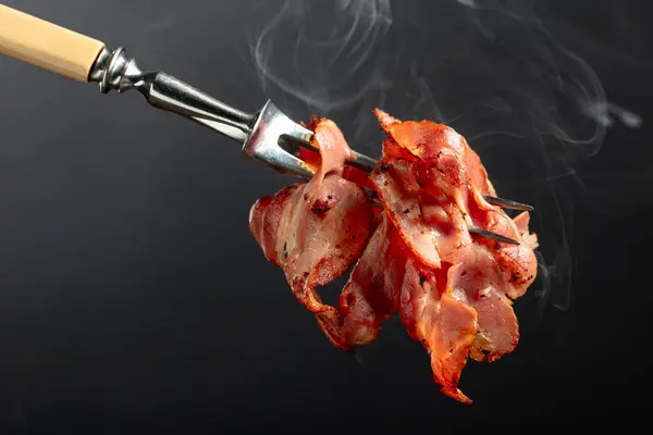 Hot Fried Bacon Slices Black Background Roasted Bacon Fork Copy — Stock Photo, Image